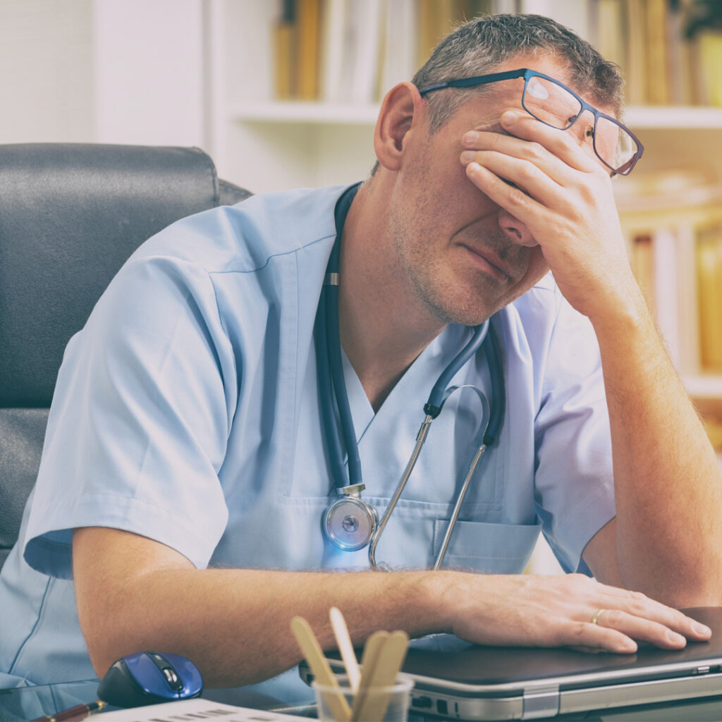 How do the US & UK rely on developing nations to mitigate staffing shortages